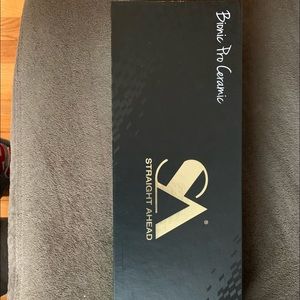 Straight ahead hair straighter and curler. New steam technology. BRAND NEW!